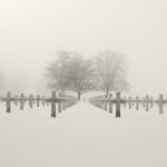 Black and white photograph by Bernard Donjean that shows the American Cemetery of Henri-Chapelle during un wintery and foggy day (name of the photograph : American Cemetery, #7)