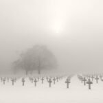 Black and white photograph by Bernard Donjean that shows the American Cemetery of Henri-Chapelle during un wintery and foggy day (name of the photograph : American Cemetery, #8)