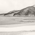 Black and white photograph by Bernard Donjean that shows the Onogawa lake in winter (name of the photograph : Onogawa Lake)