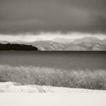 Black and white photograph by Bernard Donjean that shows a lake covered in clouds (name of the photograph : Overcast Lake)