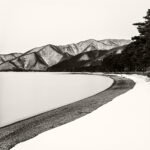 Black and white photograph by Bernard Donjean that shows the snowy shore of the quiet Hibara lake (name of the photograph : Quiet Silver Lake)