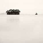 Black and white photograph by Bernard Donjean that shows two islands in the Matsushima Bay (name of the photograph : Matsushima Bay, #1)