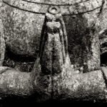 Black and white photograph by Bernard Donjean that shows the joined hands of a stone statue, representing the Anjali Mudra hands gesture in buddhism (name of the photograph : Anjali Mudra Hands Gesture)