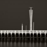 Black and white photograph by Bernard Donjean that shows the east pier and a radar tower in Ostende (name of the photograph : Radar Tower and Pier)