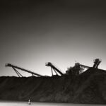 Black and white photograph by Bernard Donjean that shows an aggregates company installations in Ostende (name of the photograph : Aggregates Company Installations)