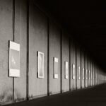 Black and white photograph by Bernard Donjean that shows a public photo exhibition in Ostende (name of the photograph : Photo Exhibition)